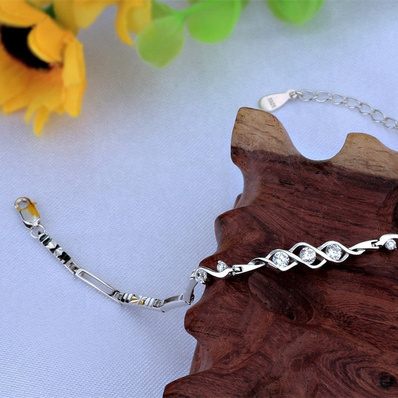 Sidabrinė rodžiuota apyrankė su cirkoniu "Twist