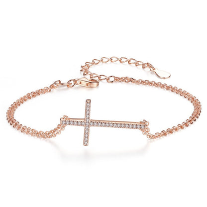 Sidabrinė paauksuota apyrankė su kryželiu