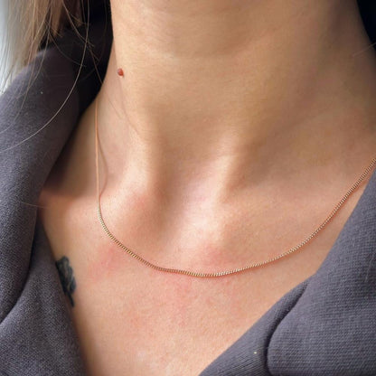 1,2 - 1,3 g sidabrinė paauksuota 0.9 mm pločio grandinėlė "Curb"