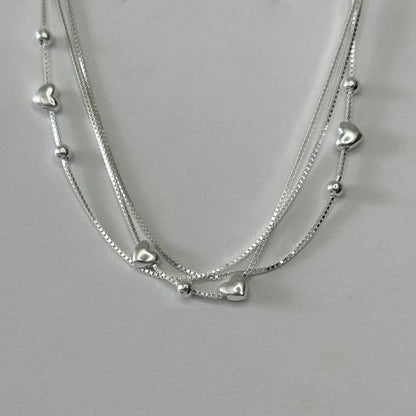 Trijų gijų sidabrinė apyrankė su širdele