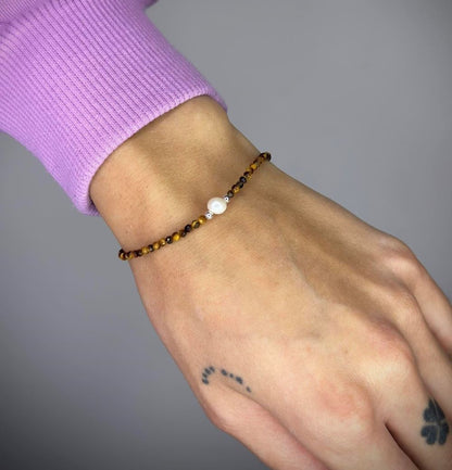 Apyrankė su tigro akies akmenukais ir tikru perlu