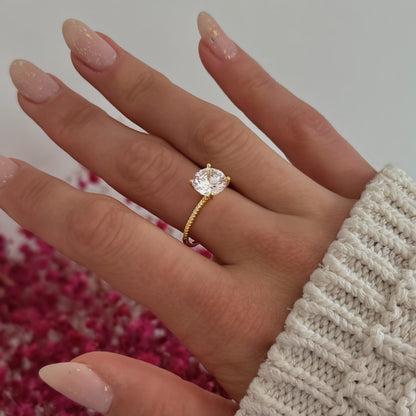 Sidabrinis auksuotas žiedas su 9 mm cirkonio akute