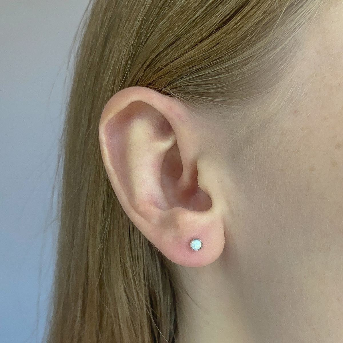 Sterling Silver Rhodium Plated Synthetic Opal Studs
