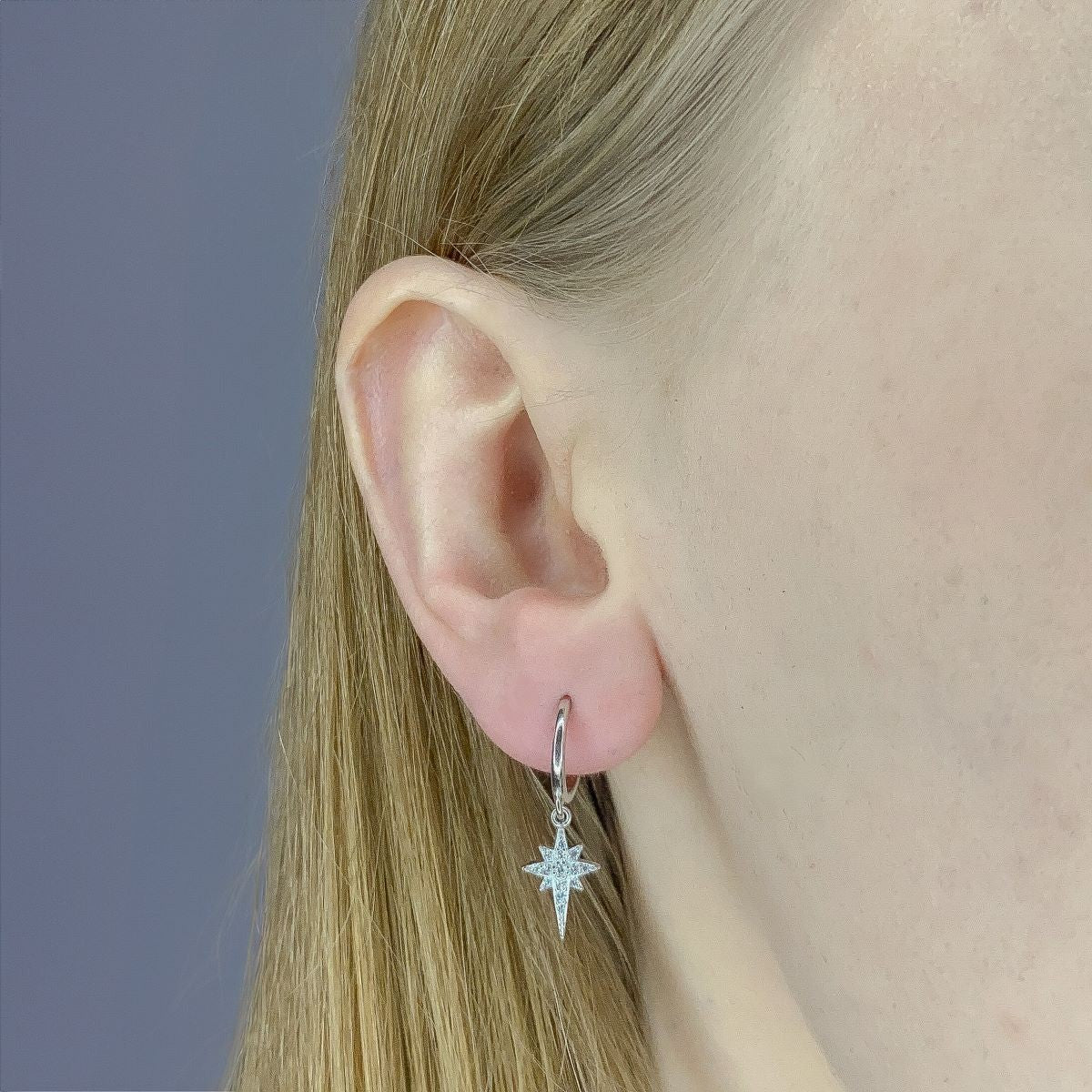 Sidabriniai auskarai su žvaigždute