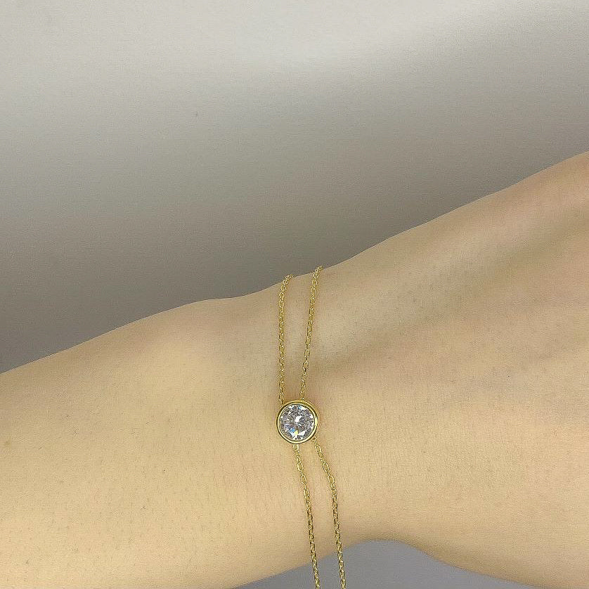 Sidabrinė auksuota apyrankė su cirkonio akute