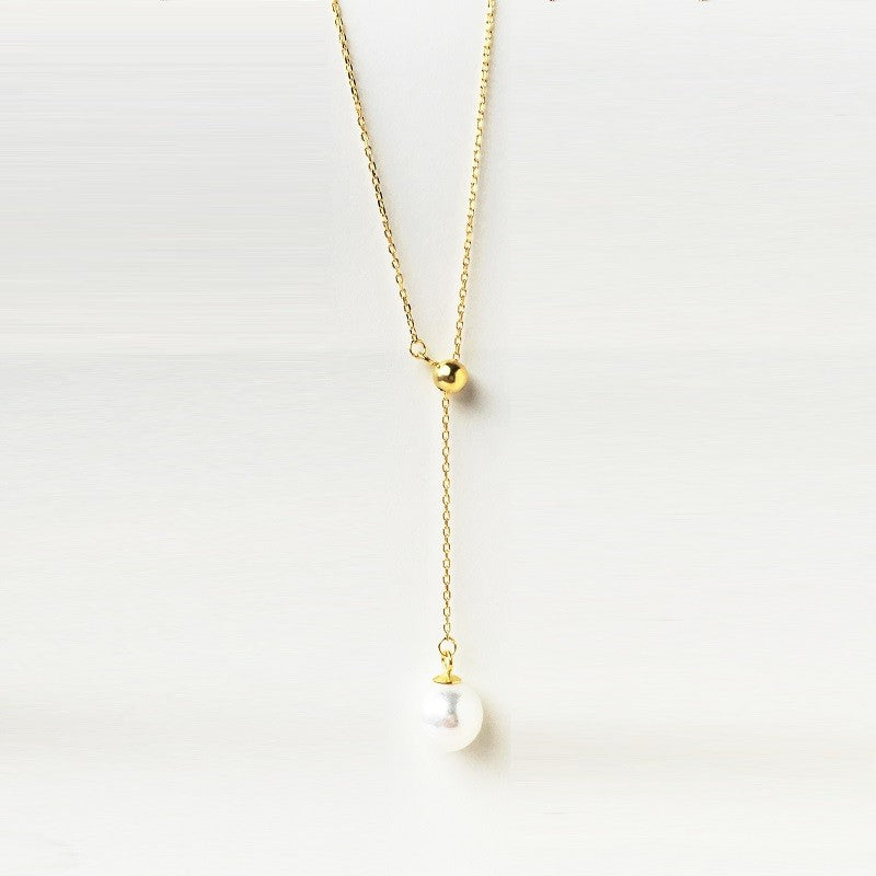 Sidabrinis auksuotas pakabukas su perlu