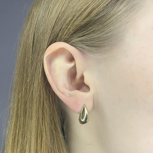 Sidabriniai lašo formos auskarai