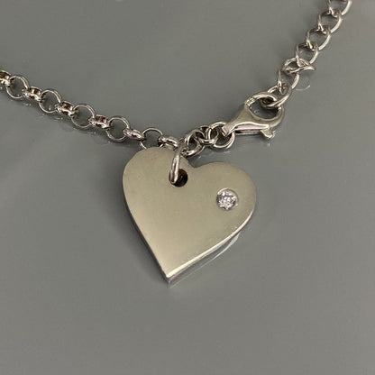 Sidabrinė rodžiuota apyrankė su kabančia širdele