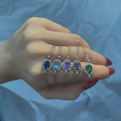 Sidabrinė rodžiuota apyrankė su ovaliu mistinio topazo akmeniu