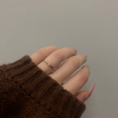 Sidabrinis paauksuotas žiedas su akute