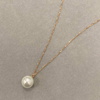 Sidabrinis paauksuotas pakabukas su perlu