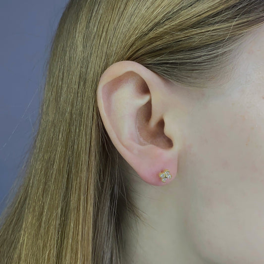 Sidabriniai auksuoti užsukami vinukai "Gėlytės"