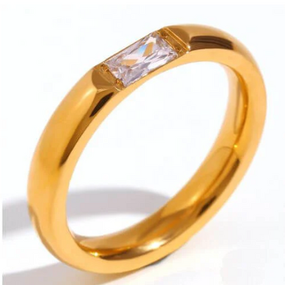 Auksuotas žiedas su stačiakampiu cirkoniu