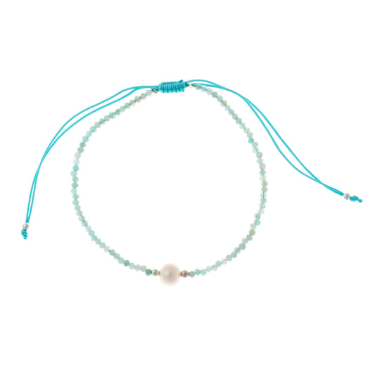 Siūlo apyrankė su perlu ir apatito akmenukais