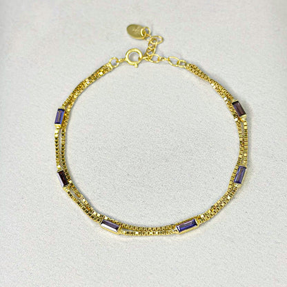 Sidabrinė auksuota dviejų gijų apyrankė su violetiniu cirkoniu