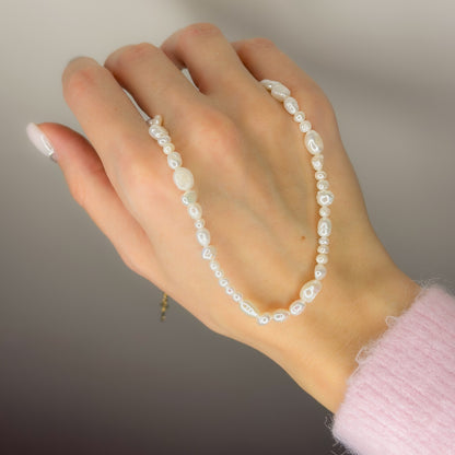 Auksuotas tikrų perlų vėrinys