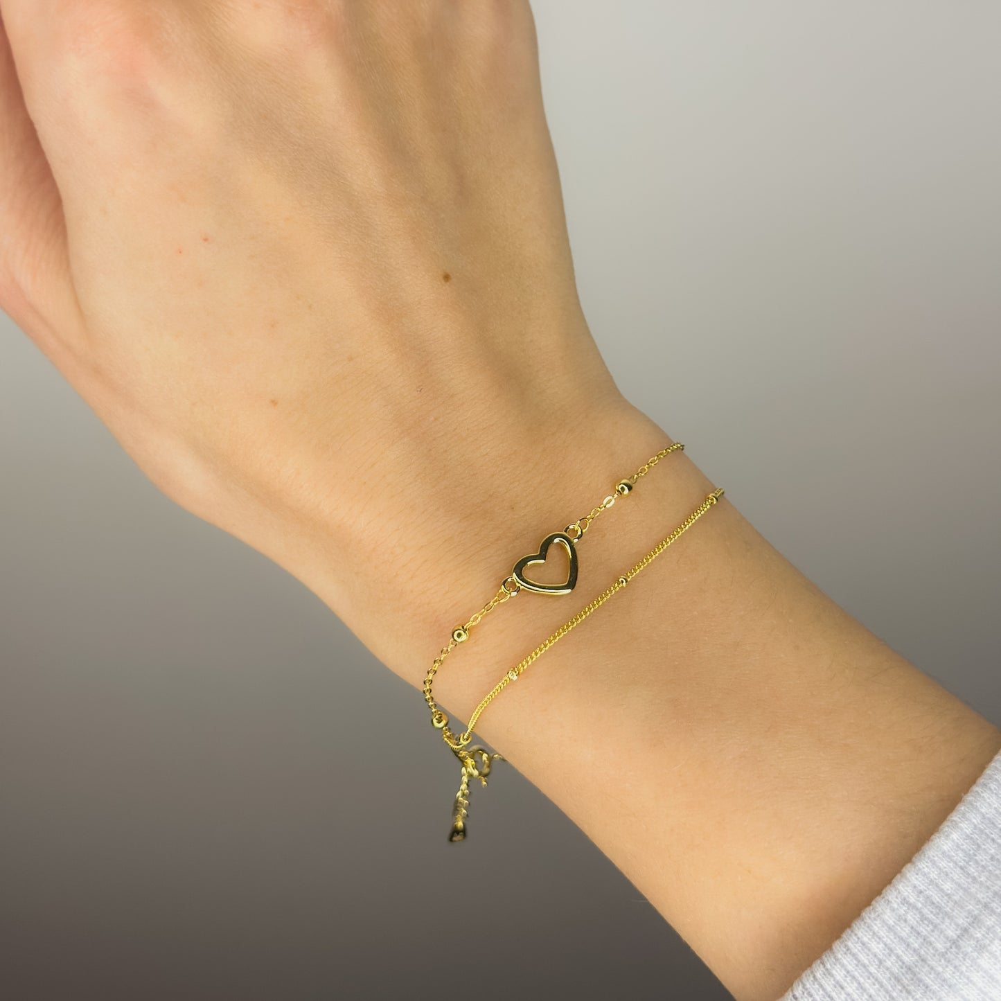 Sidabrinė auksuota dviejų gijų apyrankė su širdelėmis