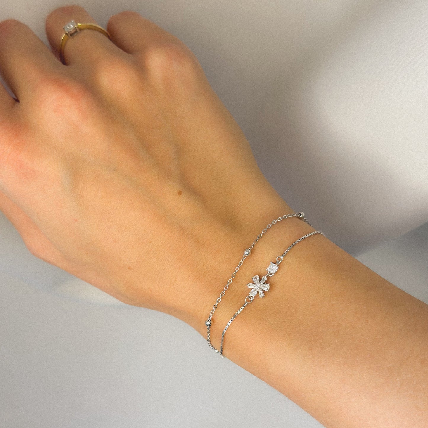 Sidabrinė dviejų gijų apyrankė su cirkoniais "Gėlyte"