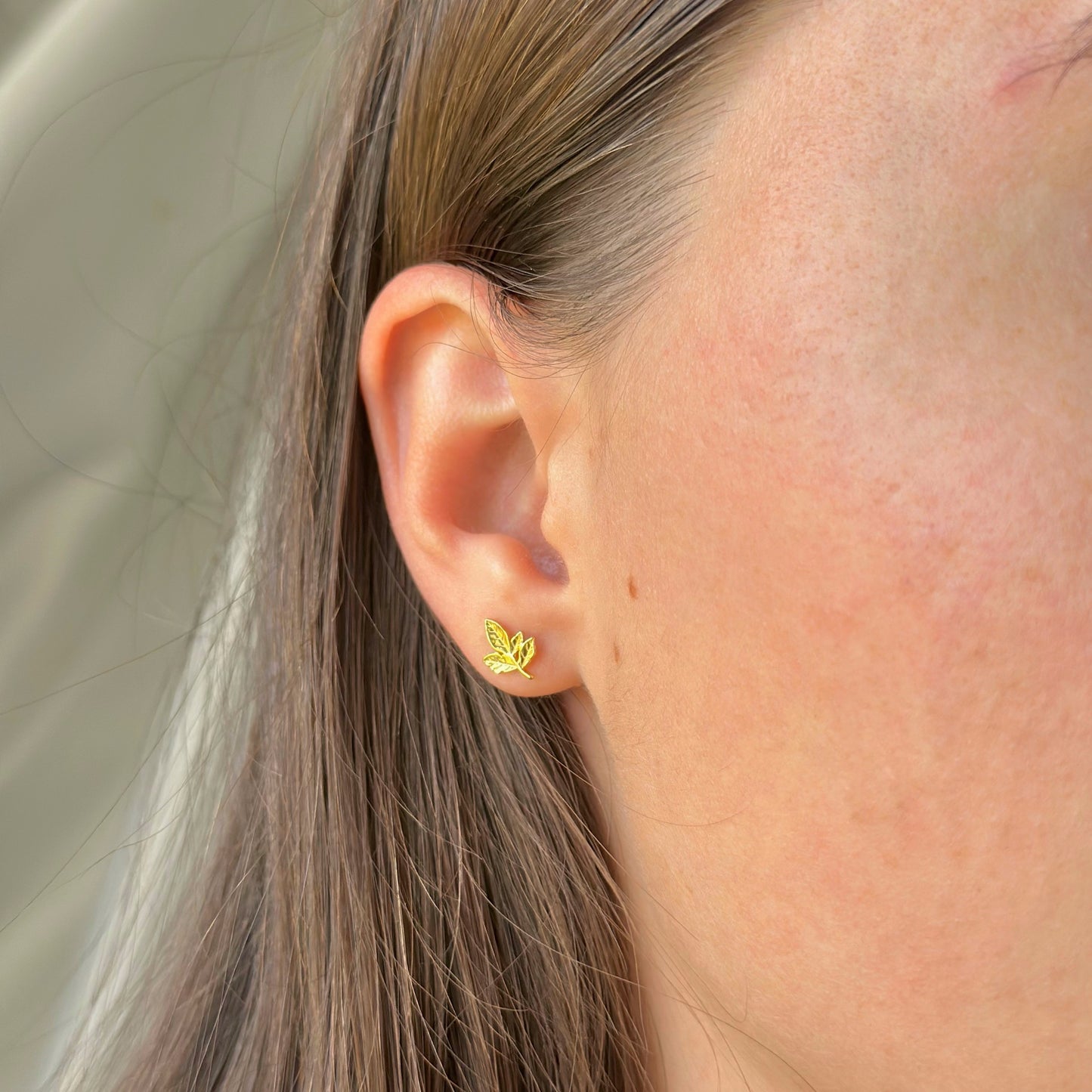 Sidabriniai auksuoti auskarai lapeliai