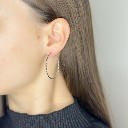 Sidabriniai sukti vinukai