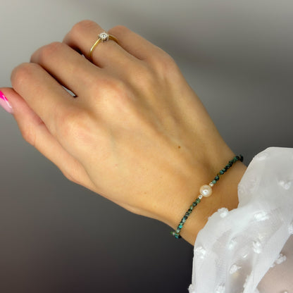 Apyrankė su afrikos turkio akmenukais ir tikru perlu