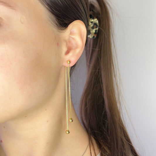 Auksuoti kabantys auskarai su grandinėle