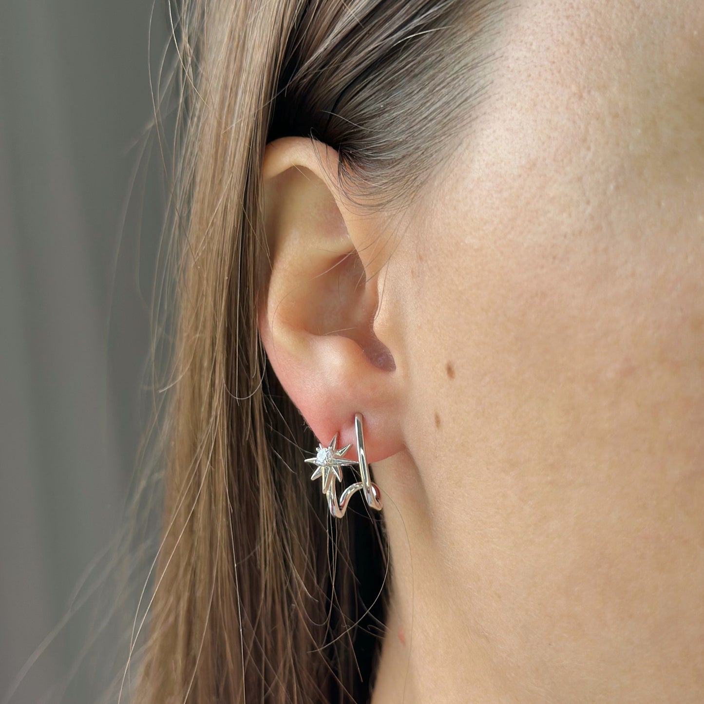 Sidabriniai auskarai su žvaigždutėmis