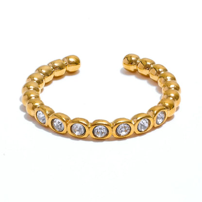 Auksuotas reguliuojamo dydžio žiedas su 7 mažais cirkoniais